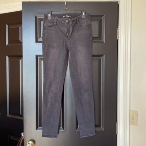 WHBM skinny jeans in black denim.